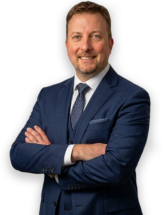 Chris Goff wearing a navy blazer with his arms crossed